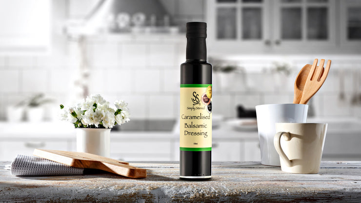 Bottle of Caramelised Balsamic Dressing displayed on beautiful kitchen bench 