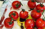Simply Stirred Caramelised Balsamic Tomatoes straight from the oven and drizzled with oil