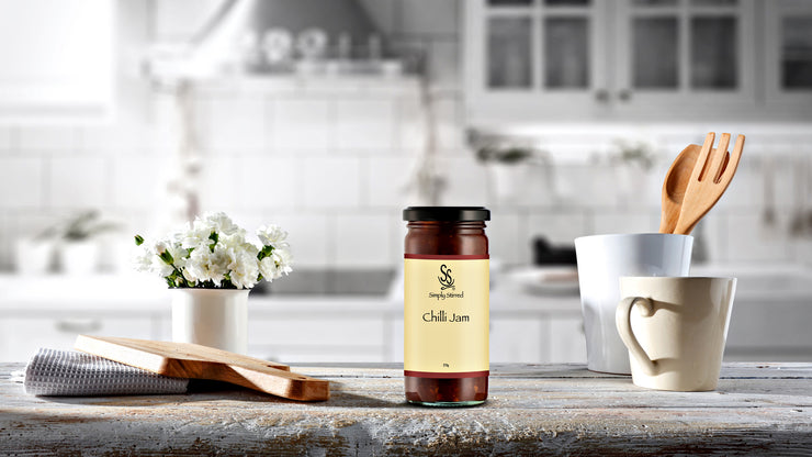 Simply Stirred chilli jam jar displayed on beautiful kitchen bench 