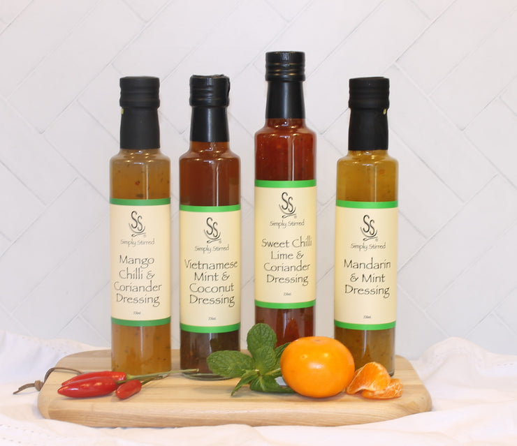 Four bottles of Simply Stirred Dressings - Try Me Dressing collection