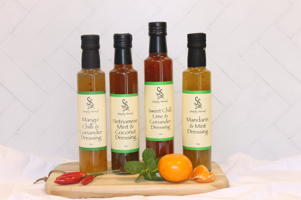 Four bottles of Simply Stirred Dressings - Try Me Dressing collection