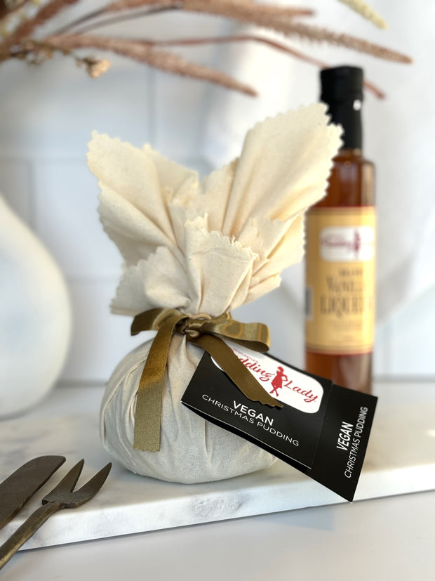 Vegan pudding wrapped in calico and gold ribbon