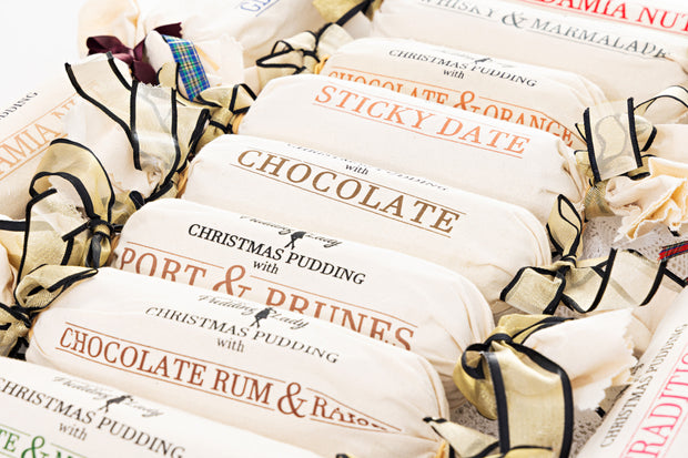 Assorted pudding logs covered in calico including chocolate log - all from Pudding Lady