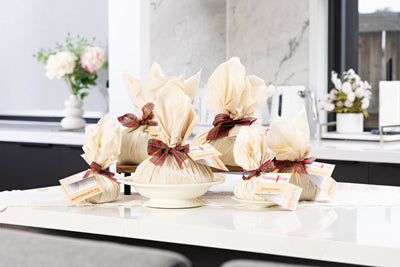 Selection of calico wrapped traditional puddings from Pudding Lady