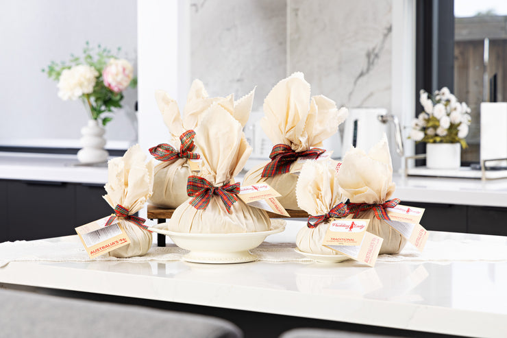 Selection of calico wrapped traditional puddings from Pudding Lady